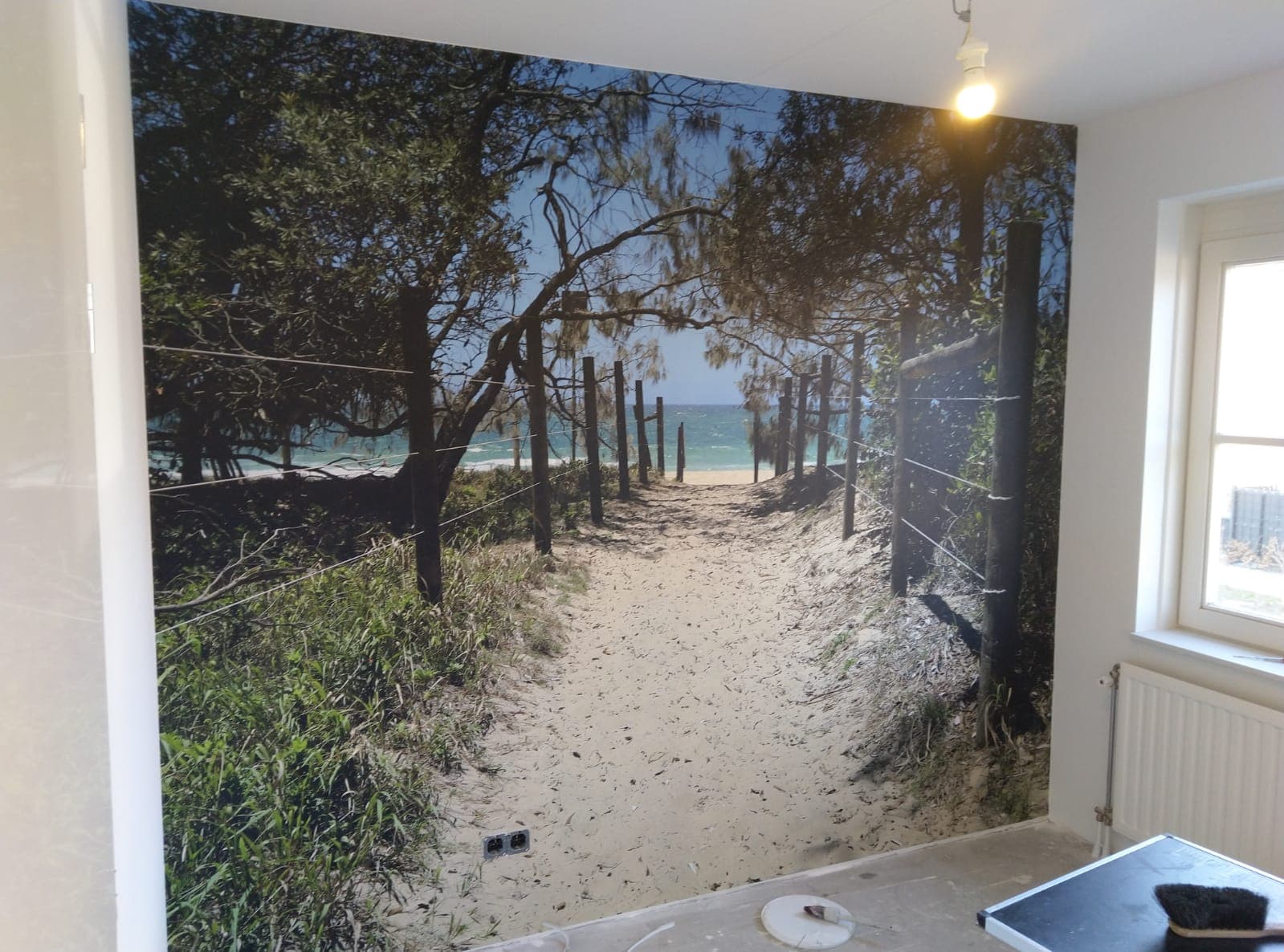 Fotobehang met een strandpad door de duinen